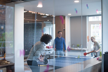 Image showing startup business team playing ping pong tennis