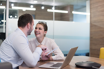 Image showing Business People Working With Tablet in startup office