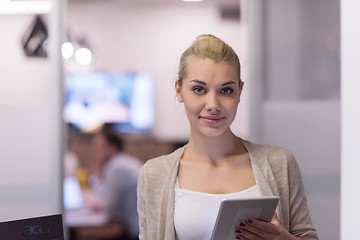 Image showing Business Woman Using Digital Tablet in front of startup Office