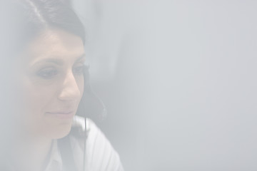 Image showing female call centre operator doing her job