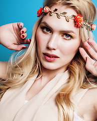 Image showing young blond woman dressed like ancient greek godess, gold jewelry close up isolated, beautiful girl hands manicured red nails 