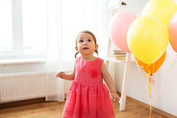 Image showing happy baby girl on birthday party at home