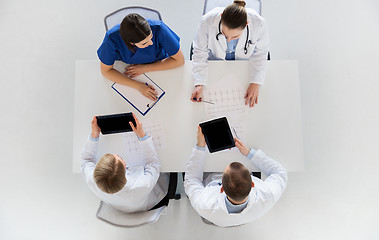 Image showing doctors with cardiogram and tablet pc at hospital