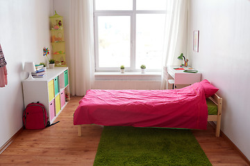 Image showing kids room interior with bed, table and accessories