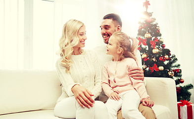 Image showing happy family at home with christmas tree