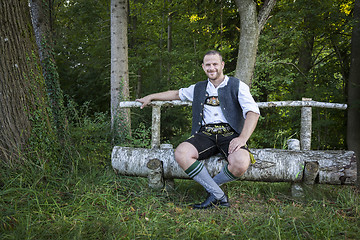 Image showing bavarian tradition man in the grass