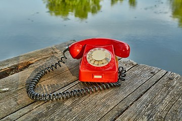 Image showing Old telephone in nature