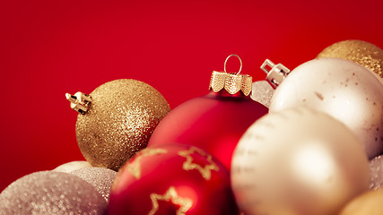 Image showing christmas balls with a red background