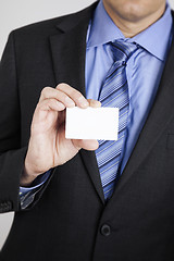 Image showing businessman shows his card