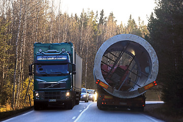 Image showing Oversize Transport and Cargo Truck Pass on Narrow Road