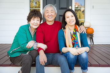 Image showing Happy Chinese Senior Adult Mother and Father with Young Adult Da