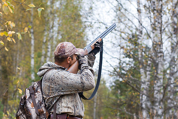 Image showing hunter taking aim in the wildfowl