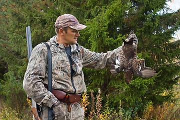 Image showing hunter with hunting trophy