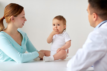 Image showing happy woman with baby and doctor at clinic