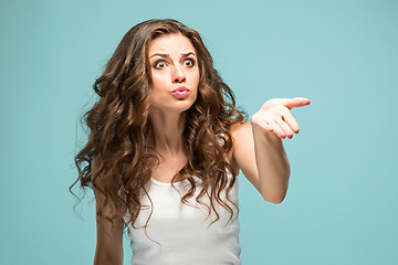 Image showing Portrait of young woman with shocked facial expression