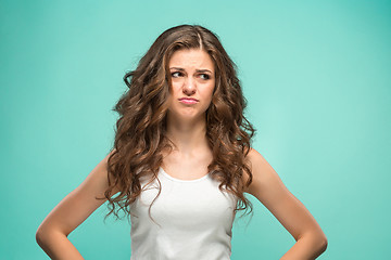 Image showing The young woman\'s portrait with sad emotions