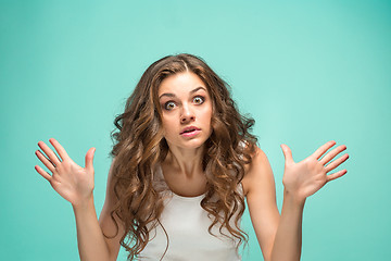 Image showing Portrait of young woman with shocked facial expression