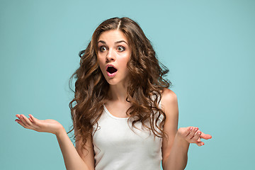 Image showing Portrait of young woman with shocked facial expression