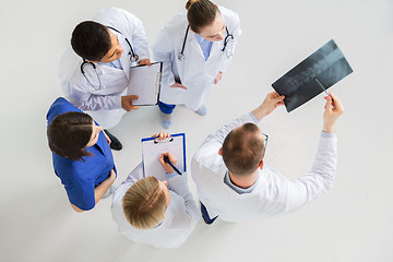 Image showing doctors with spine x-ray and clipboards