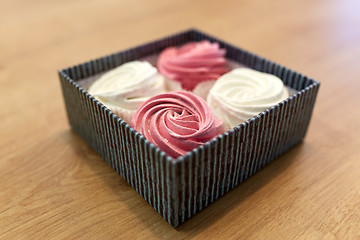 Image showing zephyr or marshmallow dessert in gift box