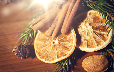 Image showing christmas fir branch, cinnamon and dried orange