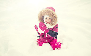 Image showing f happy little child or girl with snow in winter