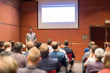 Image showing Speaker Giving a Talk at Business Meeting.