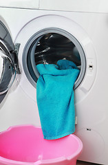 Image showing blue terry towel in washing machine