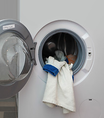 Image showing bathrobe in washing machine