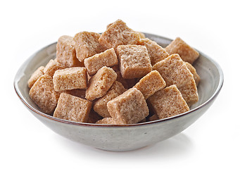 Image showing Bowl of brown sugar cubes