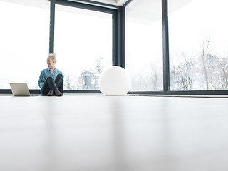 Image showing young woman drinking coffee enjoying relaxing lifestyle