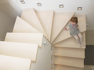 Image showing little cute girl enjoying on the stairs