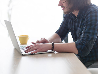 Image showing man working from home