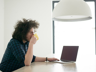 Image showing man working from home