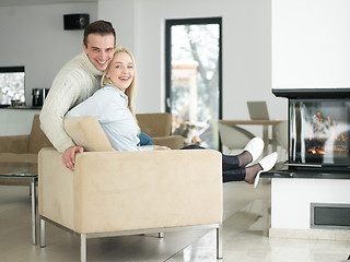 Image showing Couple using digital tablet on cold winter day