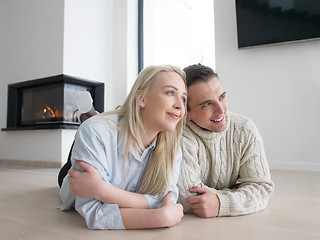 Image showing Young Couple using digital tablet on cold winter day