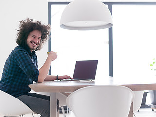 Image showing man working from home