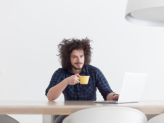 Image showing man working from home