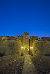 Image showing The fortress wall in the harbor at sunset. Rhodes