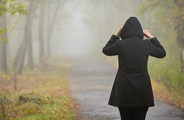 Image showing Woman In A Foggy Forest 