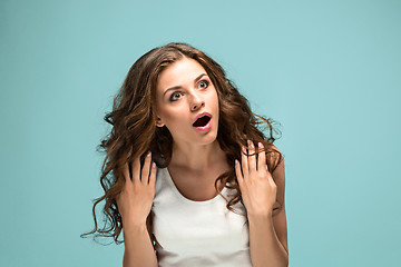 Image showing Portrait of young woman with shocked facial expression