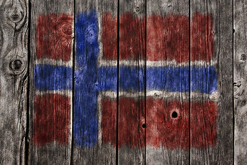 Image showing norwegian flag on aged wooden wound