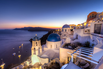 Image showing Traditional greek village of Oia at dusk, Santorini island, Greece.