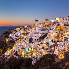 Image showing Oia village at sunset, Santorini island, Greece.