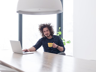 Image showing man working from home