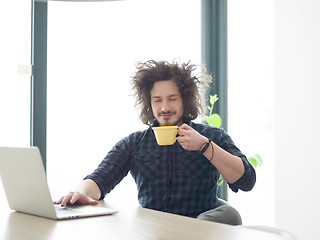 Image showing man working from home