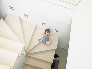 Image showing little cute girl enjoying on the stairs