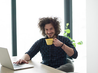 Image showing man working from home