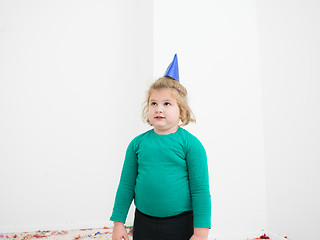 Image showing kid blowing confetti