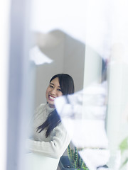 Image showing asian woman enjoying at home